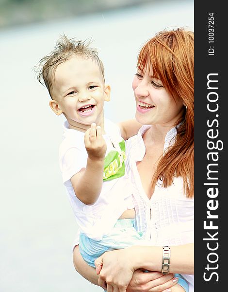 Happy mother and son outdoors