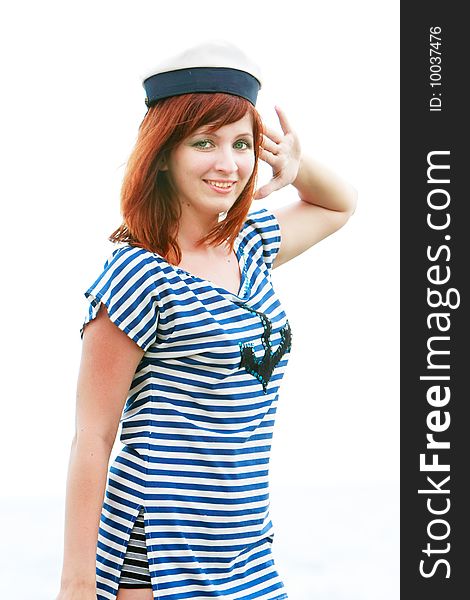 Attractive girl in striped vest saluting