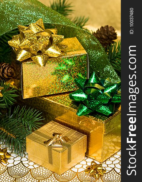 Gold gift boxes with Christmas tree