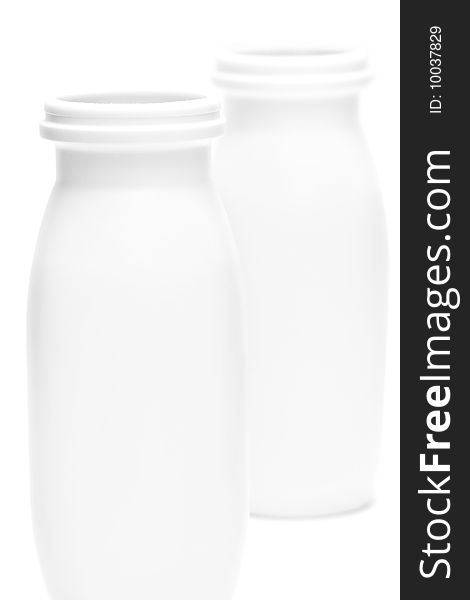 Two jars with milk