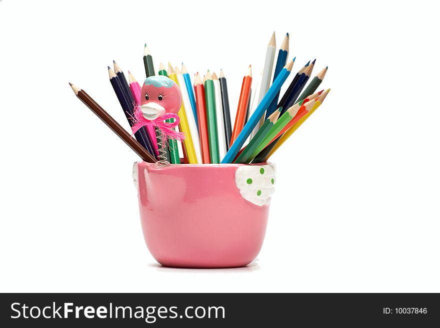 Color pencils for the drawing, located in a support as a vase. Color pencils for the drawing, located in a support as a vase