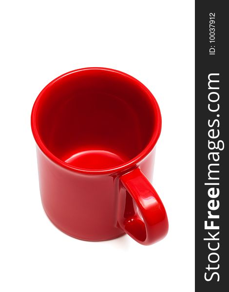 Beautiful red cup on a white background