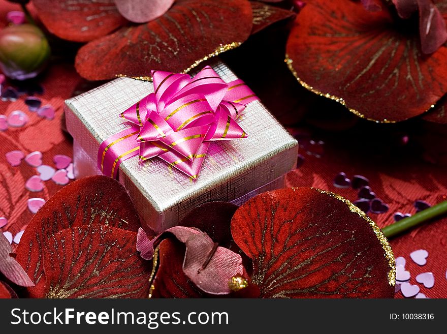 Gift box with red flowers