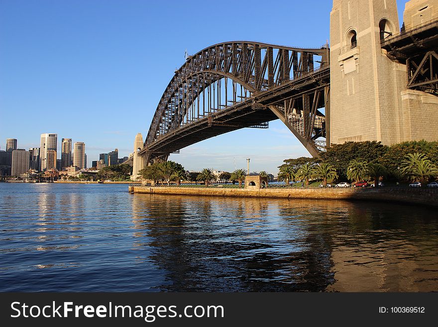 Classic Sydney Harbour bridge. Wonderfully light by the newly risen sun. Classic Sydney Harbour bridge. Wonderfully light by the newly risen sun.