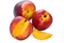 Three Nectarines And Segment Stock Photography Three Nectarines And Segment Stock Photography