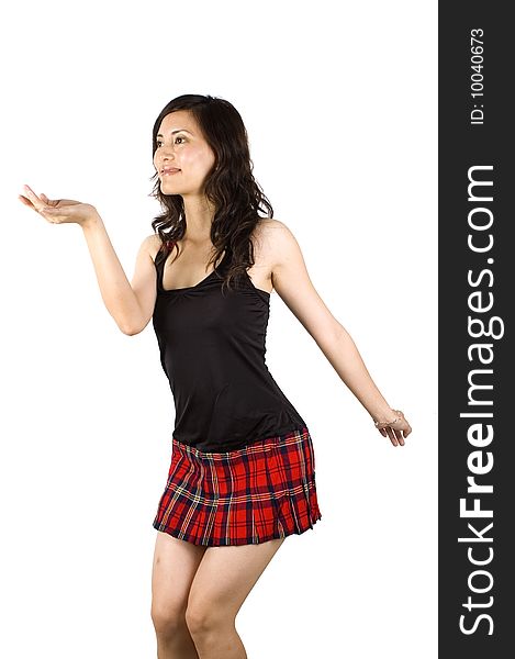 Chinese girl, putting short skirt, smiling, happy, kind face expression. Chinese girl, putting short skirt, smiling, happy, kind face expression.