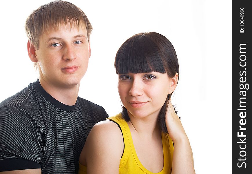 Portrait of young happy pair on a white background. Portrait of young happy pair on a white background