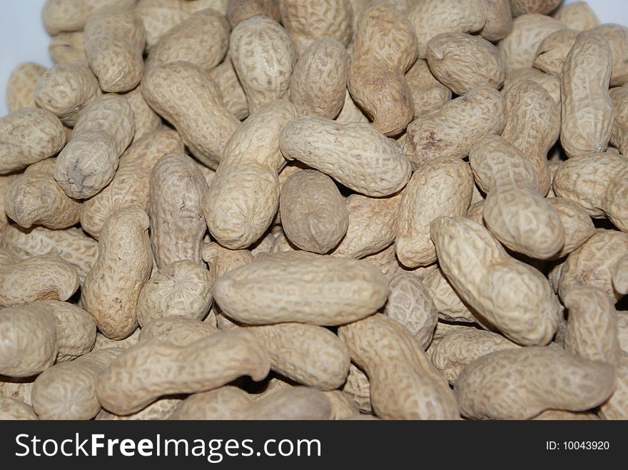 A bunch of peanuts asking to be taken while waying for someone to get some of then