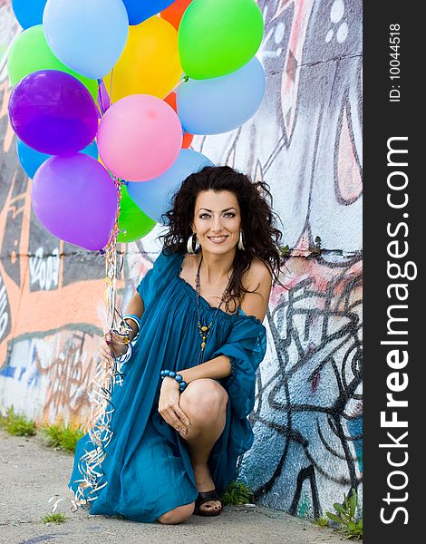 Happy woman with balloons