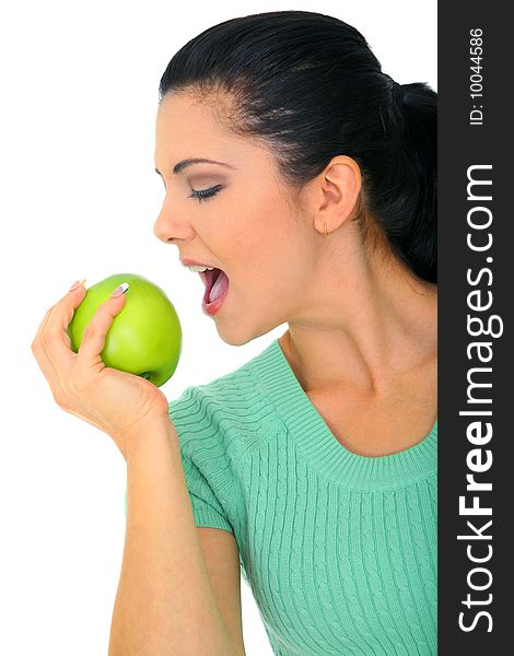 Young attractive woman eating green apple. isolated on white. Young attractive woman eating green apple. isolated on white