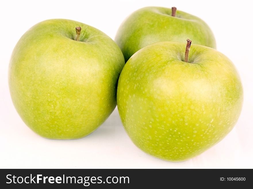 Three  green apples isolated on white background. Three  green apples isolated on white background