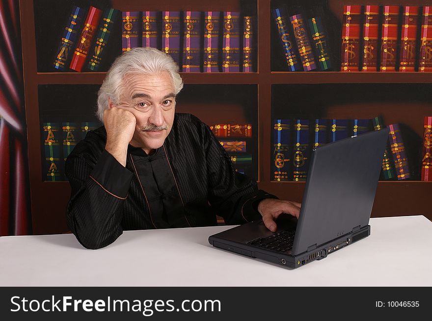 Man in black with laptop