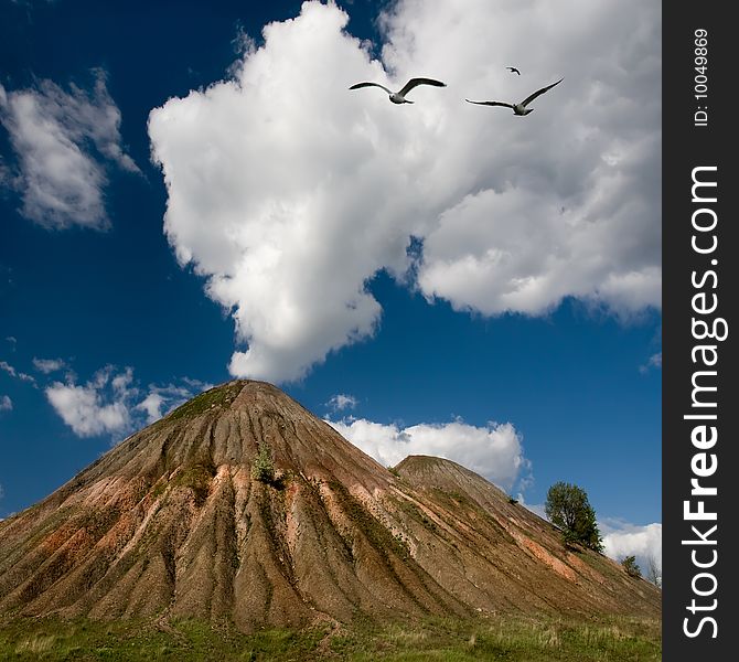 Clouds over a colliery waste heap in Ukraine. Clouds over a colliery waste heap in Ukraine