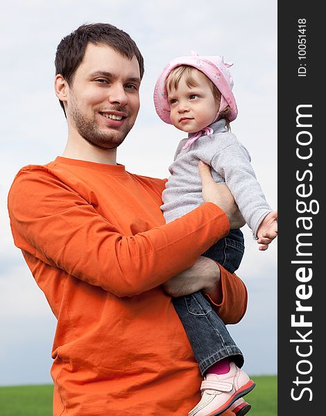 Portrait of a little girl with father outdoors. Portrait of a little girl with father outdoors