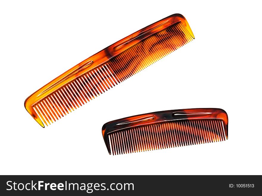 Two beautiful hairbrushes on a white background