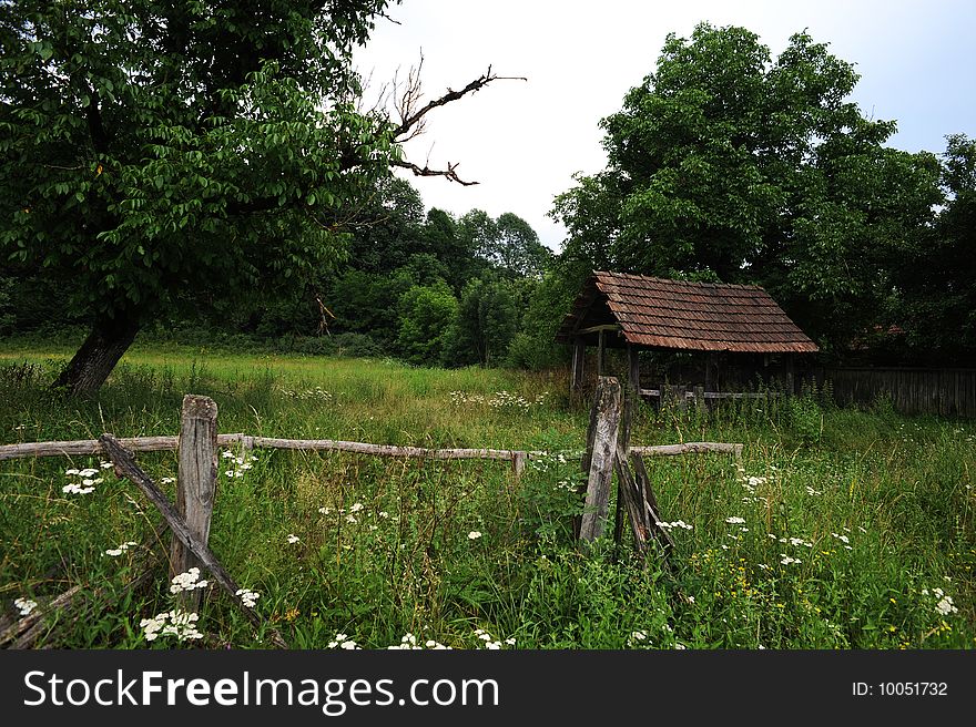 Old Hut In Country Landscape