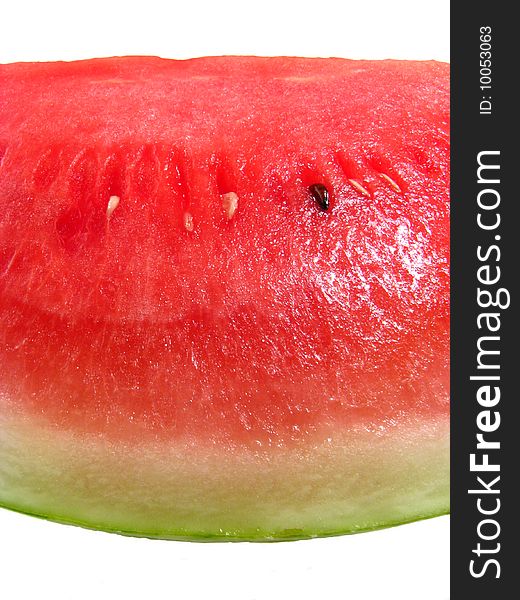 Closeup of a red, ripe watermelon on a white background