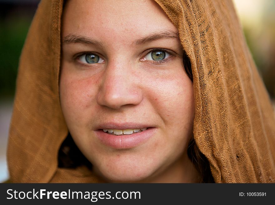 A Beautiful Girl with a cloth hood and green eyes. A Beautiful Girl with a cloth hood and green eyes