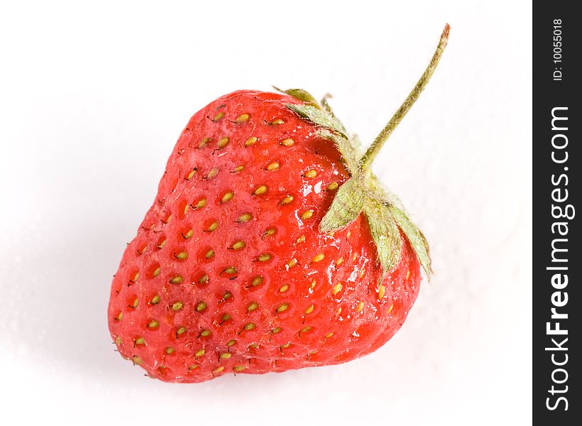 Fresh Strawberry. Shallow depth of field, selective focus. Macro shot. Extreme closeup.