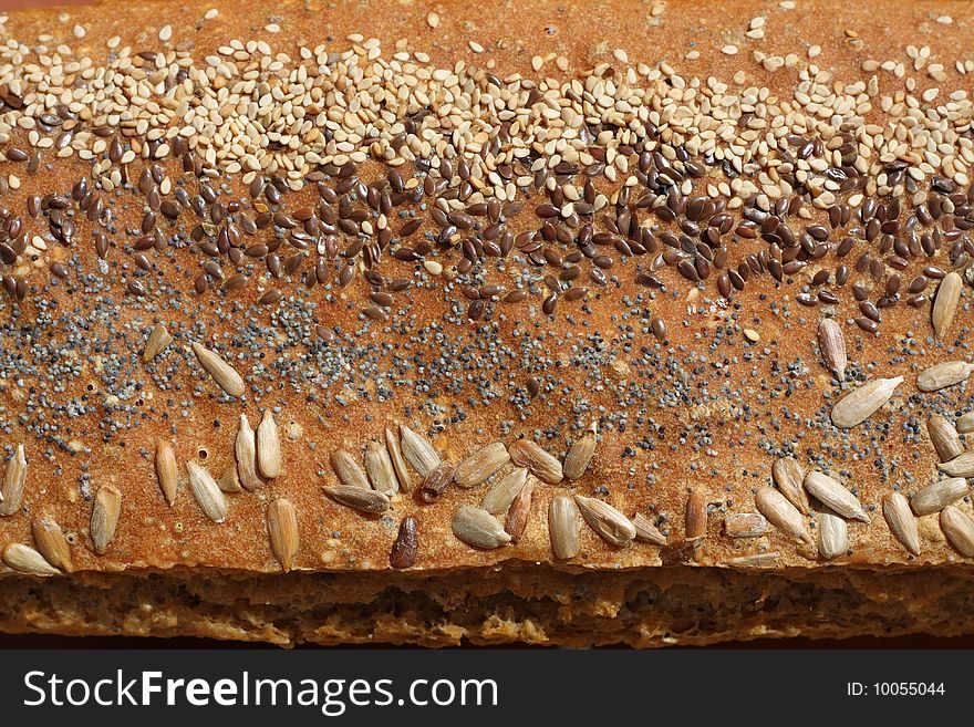 A fresh homemade bread with lots of seeds. A fresh homemade bread with lots of seeds