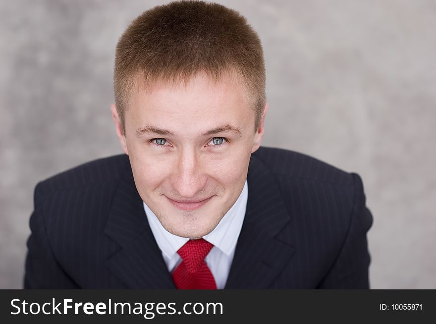 Portrait of a happy young businessman, smiling