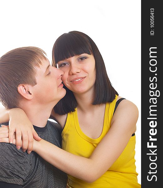 Portrait of young happy pair on a white background. Portrait of young happy pair on a white background