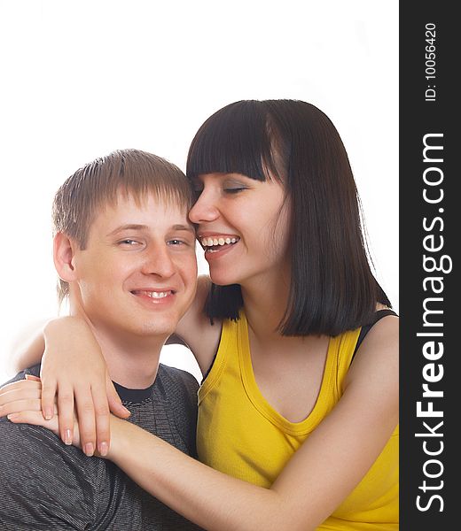 Portrait of young happy pair on a white background. Portrait of young happy pair on a white background