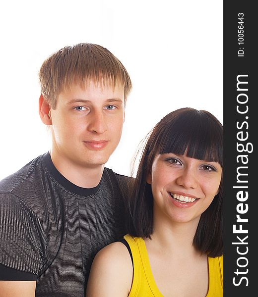 Portrait of young happy pair on a white background. Portrait of young happy pair on a white background