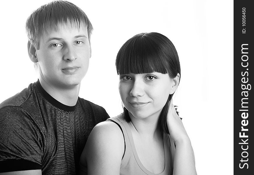 Portrait of young happy pair on a white background. Portrait of young happy pair on a white background