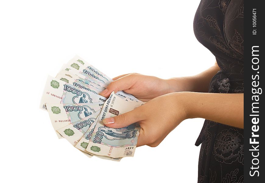 Russian money in hands at the woman on a white background