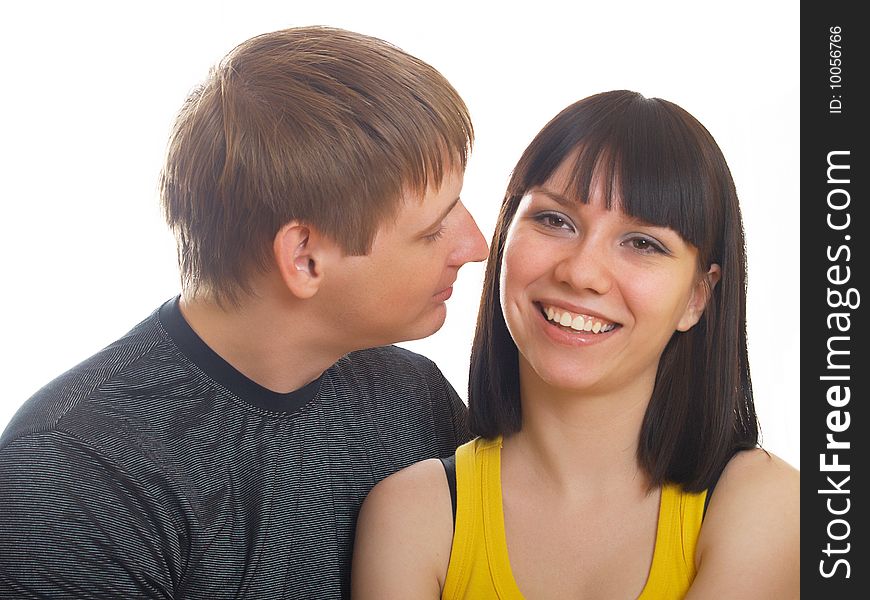 Portrait of young happy pair on a white background. Portrait of young happy pair on a white background