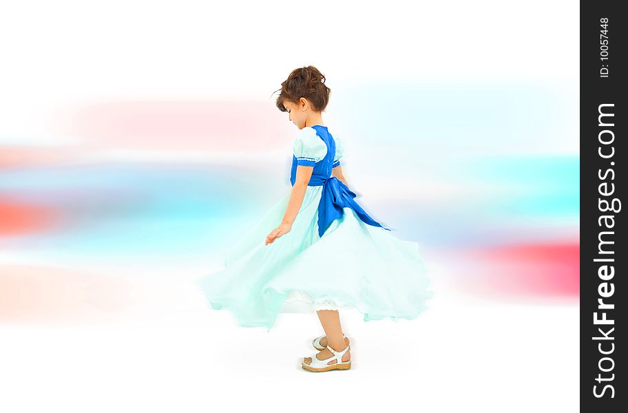 Cute little girl in blue dress dancing. Cute little girl in blue dress dancing