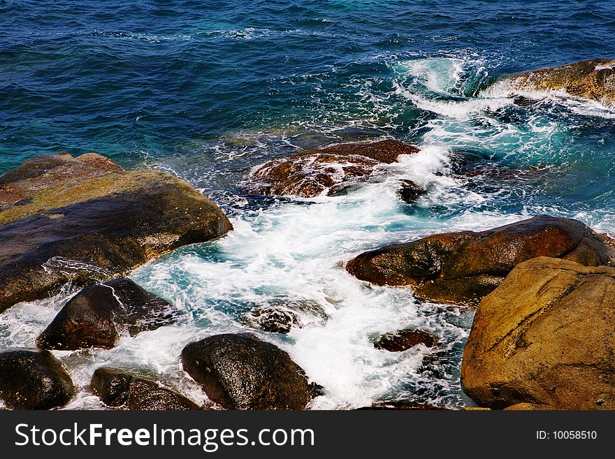 Rocks And Reefs Under The Waves