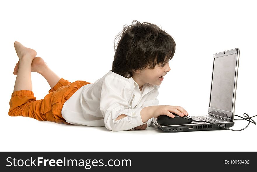 The merry boy with laptop on white background