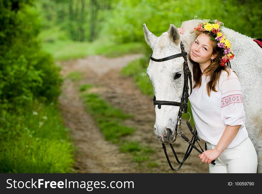 Attractive Girl In Floral Wreath