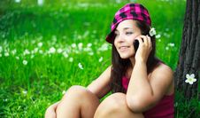 Pretty Girl Talking On The Cellphone Royalty Free Stock Photo