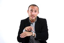 Businessman Showing Watch Royalty Free Stock Image