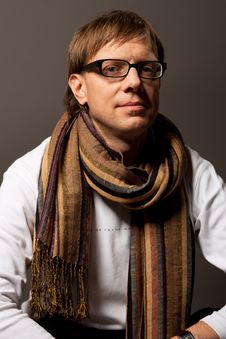 Man In Glasses And Scarf Smiling Stock Photo Man In Glasses And Scarf Smiling Stock Photo