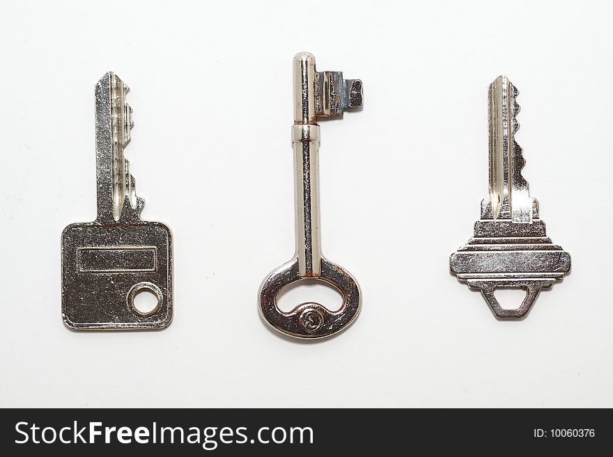 A bunch of keys isolated on white background.
