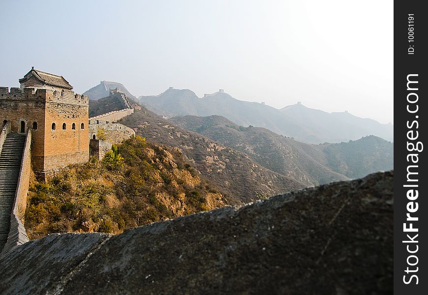 View of the Great Wall of China as it sprawls across the hills in Simatai near Beijing (restored section)