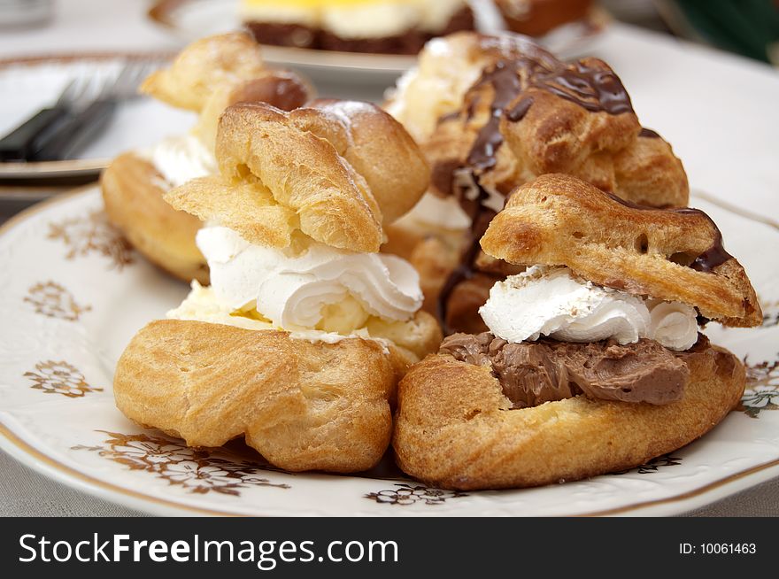 Hungarian creamy doughnuts on a plate. Hungarian creamy doughnuts on a plate