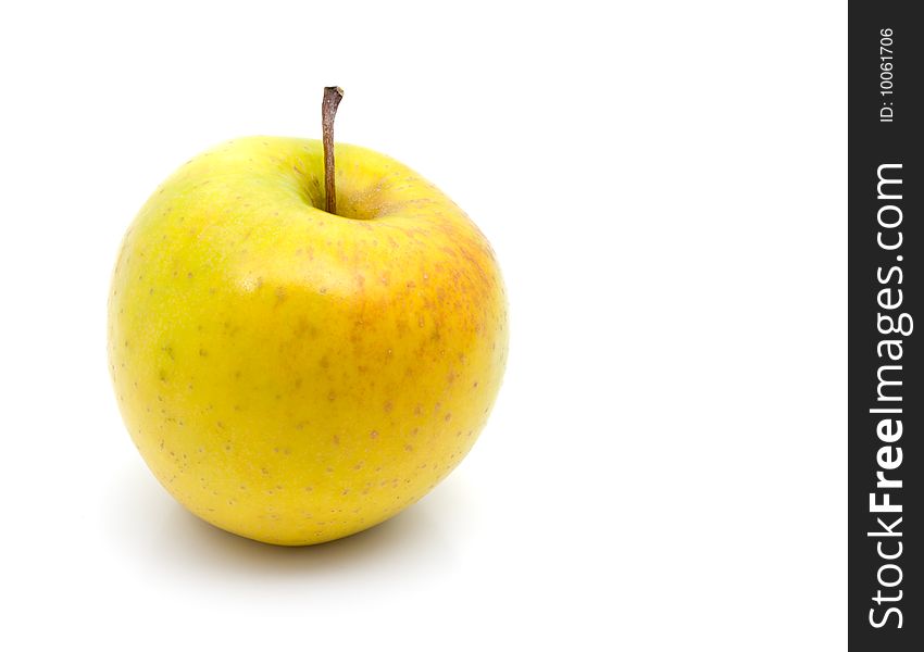 Isolated apple on a white background. A place for an inscription on the right