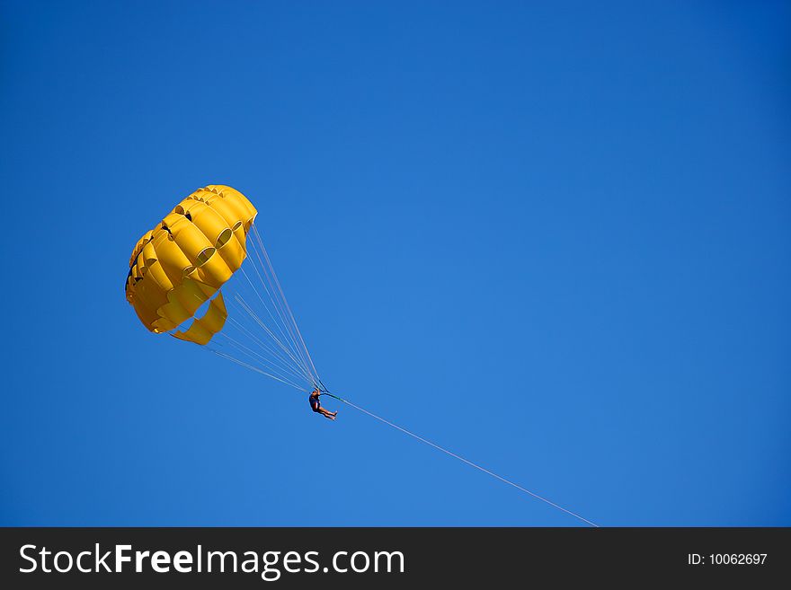 Parasailing, man flying on sky