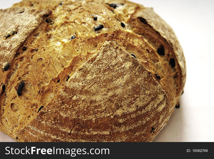 Detail of fresh white bread with black olives. Detail of fresh white bread with black olives