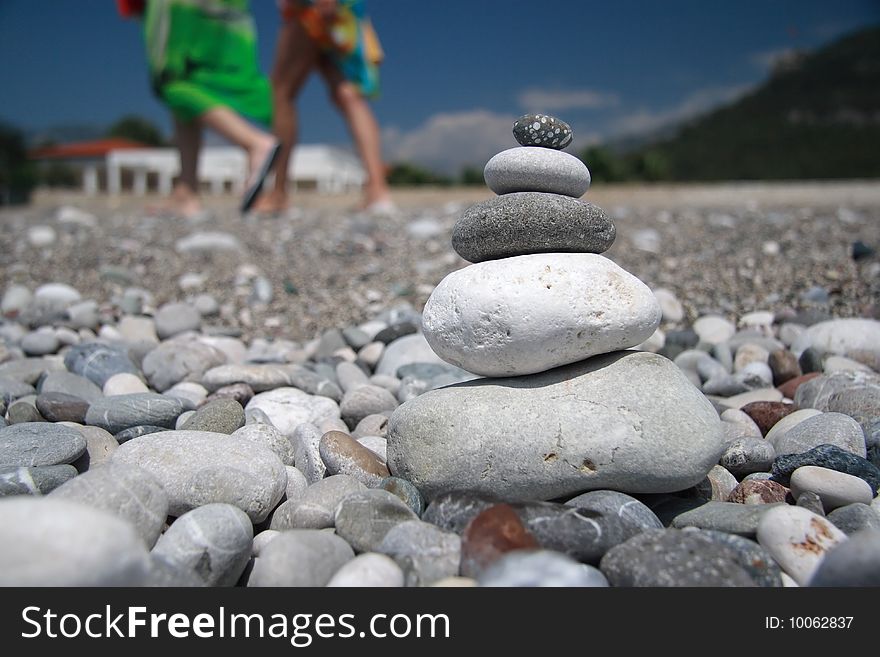 Stones on the beach pyramid