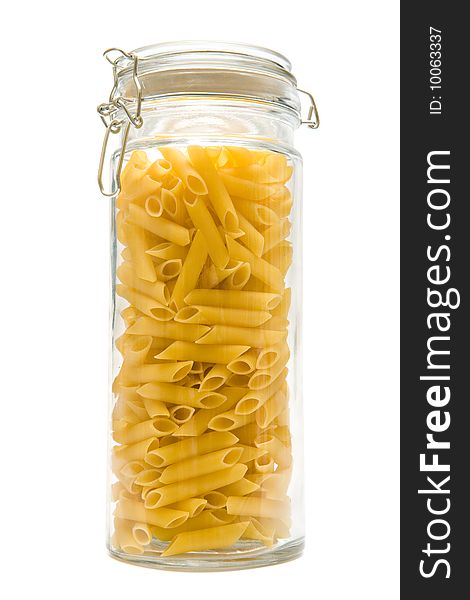 Macaroni in glass jar on a white background