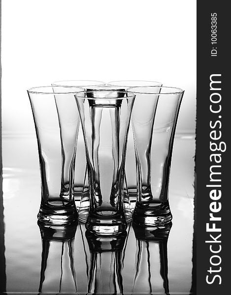 A set group of glasses with one inverted