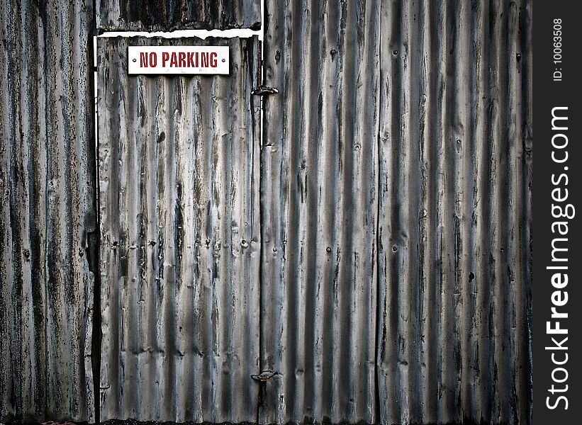 Taken in Dublin Ireland of a metal wall and door with nice texture. Taken in Dublin Ireland of a metal wall and door with nice texture