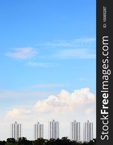 Urban condominium with blue sky background, bangkok, Thailand