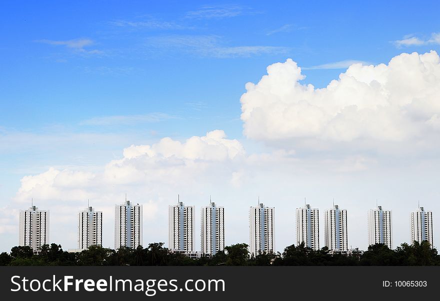 Urban condominium with blue sky background, bangkok, Thailand